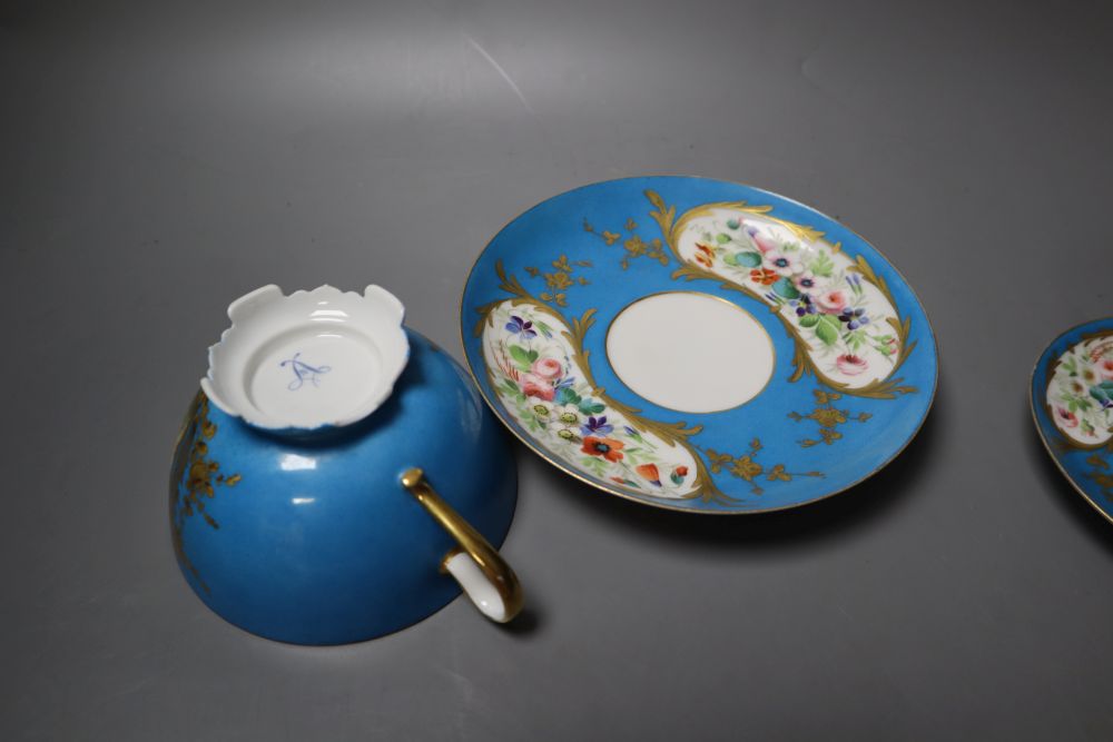 A Sevres coffee cup and saucer, a breakfast cup & saucer, coffee cup & saucer and a coffee cup